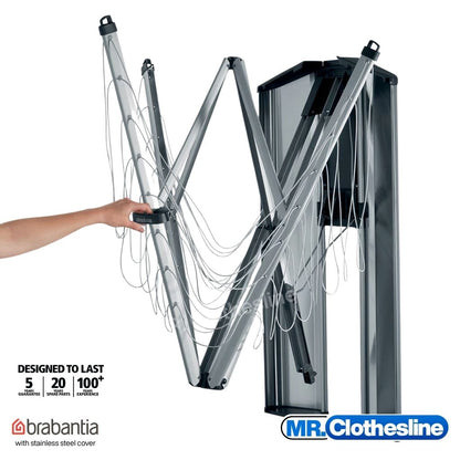Wall fix clothesline being opened with one hand. Stainless steel cover hasd been opened. 