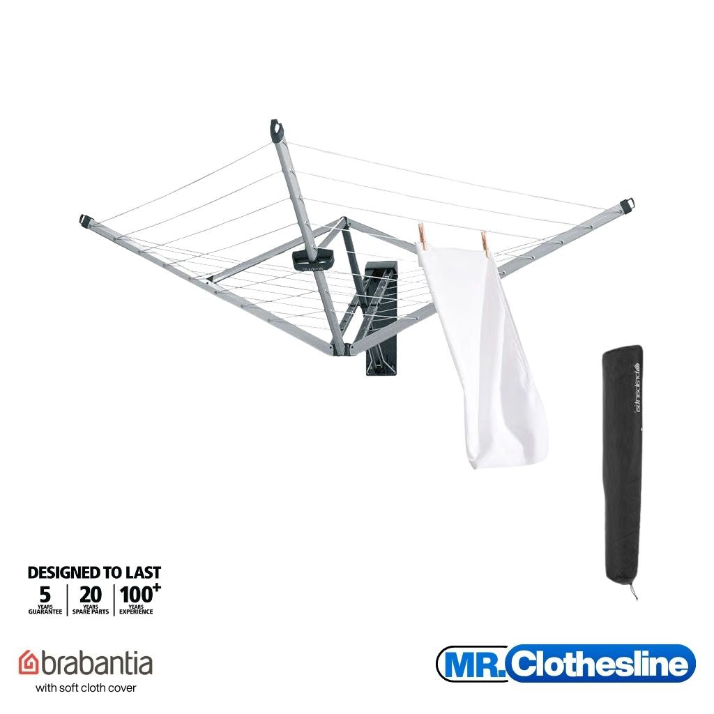 Wall fix clothesline open on a white background with a soft cloth cover in the lower right hand side of the photo.