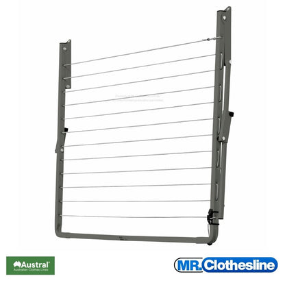 Austral Indoor Outdoor Fold  Down Clothesline front view and the clothesline closed flat against a white wall.