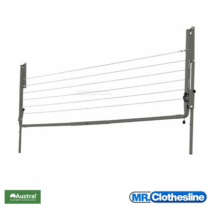 Austral Slenderline 20 Fold  Down Clothesline front view and the clothesline closed flat against a white wall.