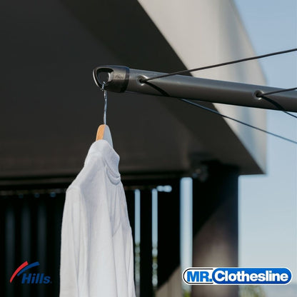 Hills Folding Rotary 8-Line Clothesline arm tip coathanger hook detail in Monument colour with white shirt on wooden hanger