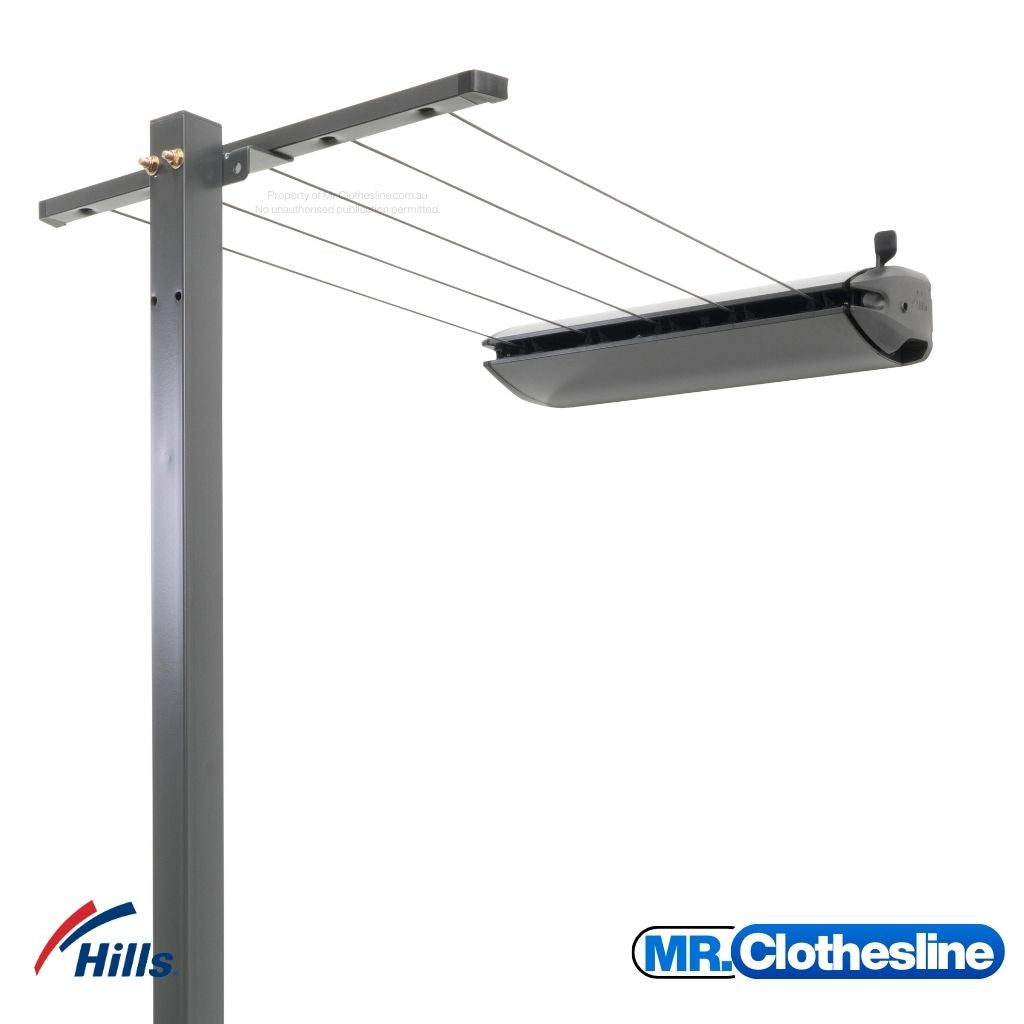 Hills Retractable 7-Line Clothesline cabinet mounted on a post with receiving bracket mounted on a ground mount post.