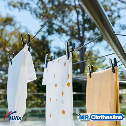 Hills soft grip pegs being used on a rotary clothesline.